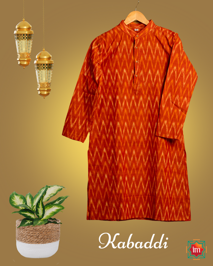 Unisex orange kids kurta hanged on a hanger.