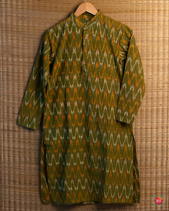 Unisex green kids kurta , where in the detailed print is displayed.