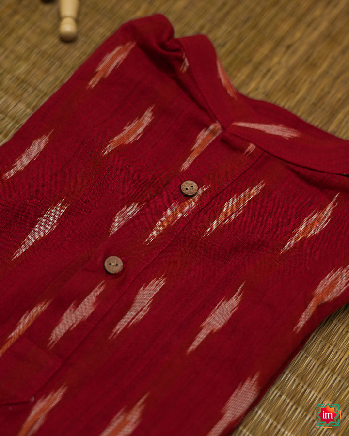 Beautiful red girl kurta, where in the detailed print is displayed.