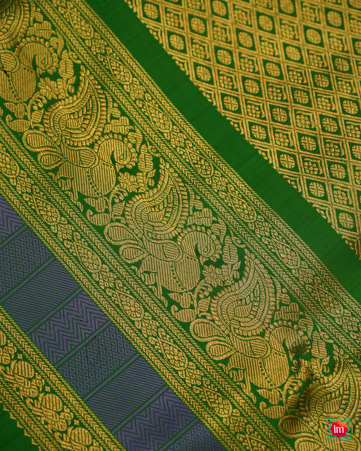 Beautiful Rexona Green Kanjivaram Saree, where in the detailed saree print is displayed.