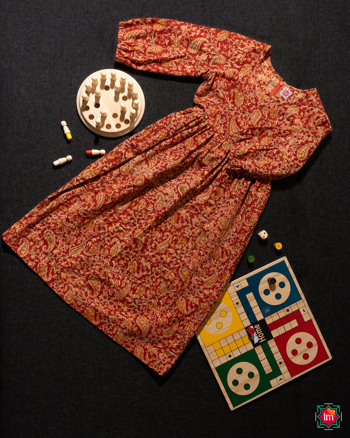 Elegant girl fork which is kept on a black background with some children indoor games are kept beside.