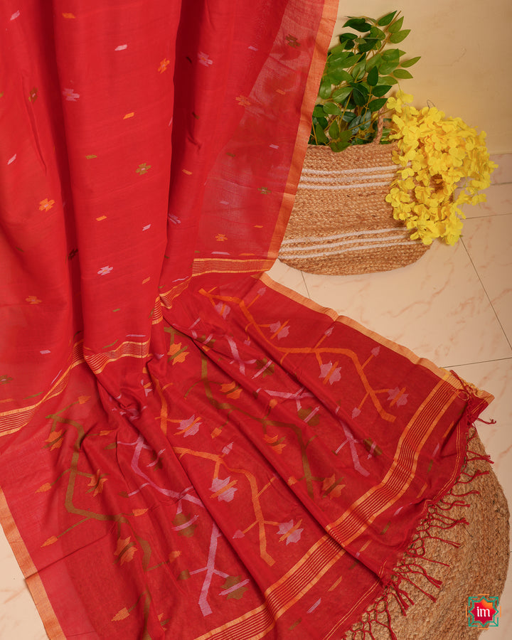 Red handloom saree is displayed.