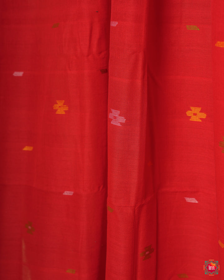 Red handloom saree is displayed.