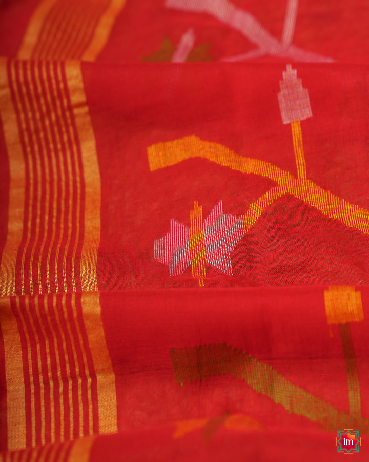 Red handloom saree, where in the detailed saree print is displayed.