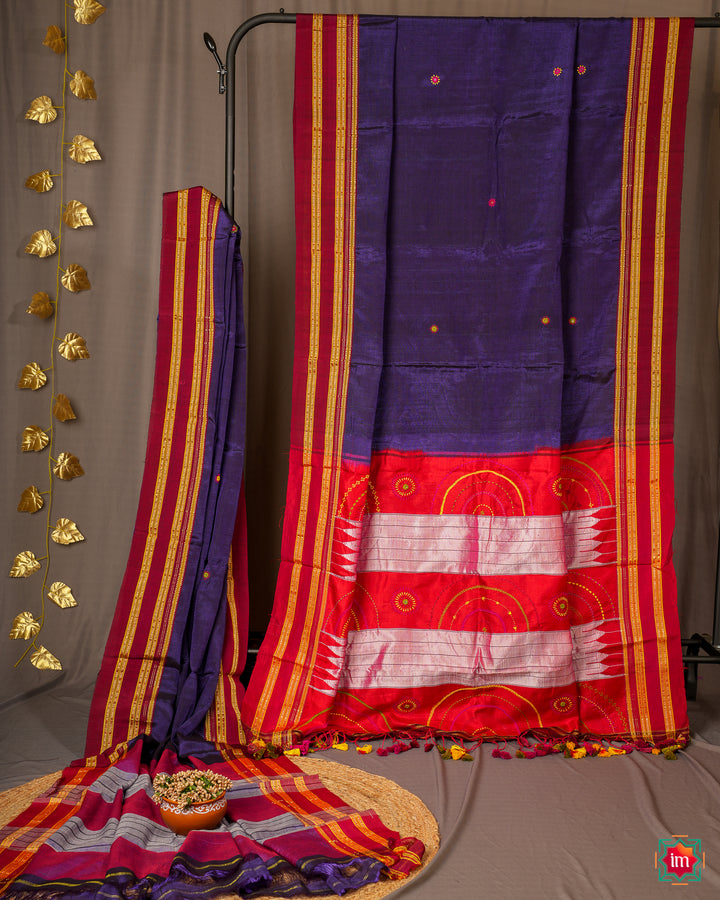 Elegant Ilkal Cotton Purple Saree is pleated and displayed on a stand.