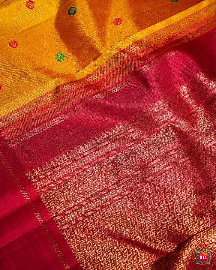 Yellow Red Ganga Jamuna Kanjivaram Silk Saree Prin is displayed